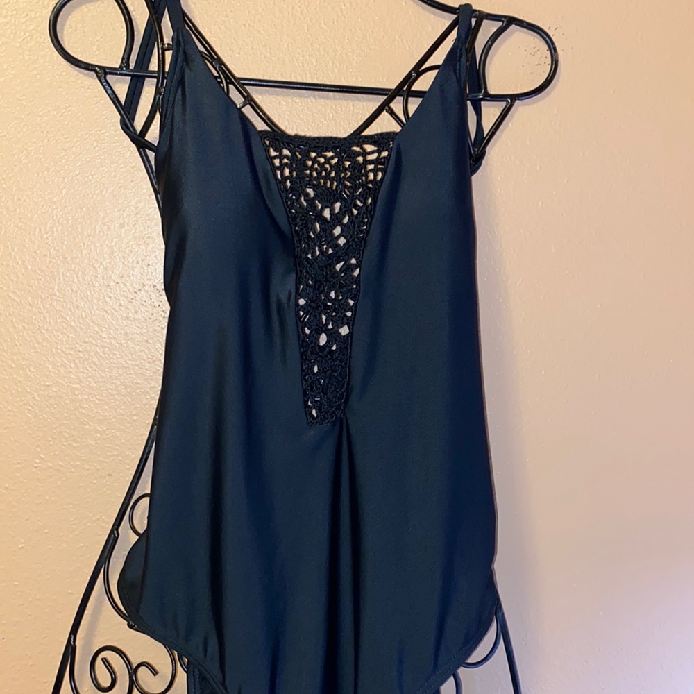 Xhileration sleek black one piece swimsuit with back crisscross lace